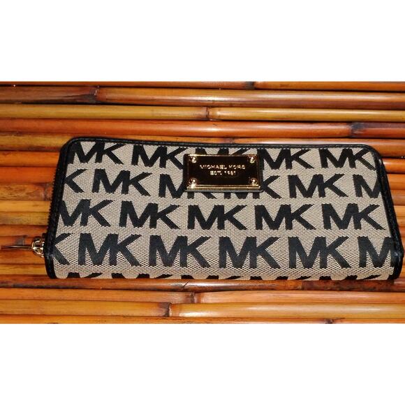 Michael Kors Handbags - Michael Kors Jet Set Travel Continental Wallet  Black & Beige MK Logo Zip Around